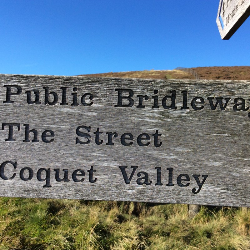 The Coquet Valley, the Pennine Way and Windy Gyle sign